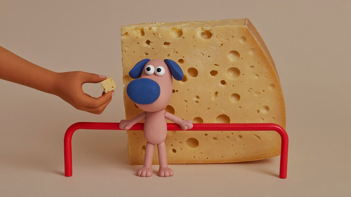 A pea-sized piece is the right cheese portion — the wedge stays out of reach